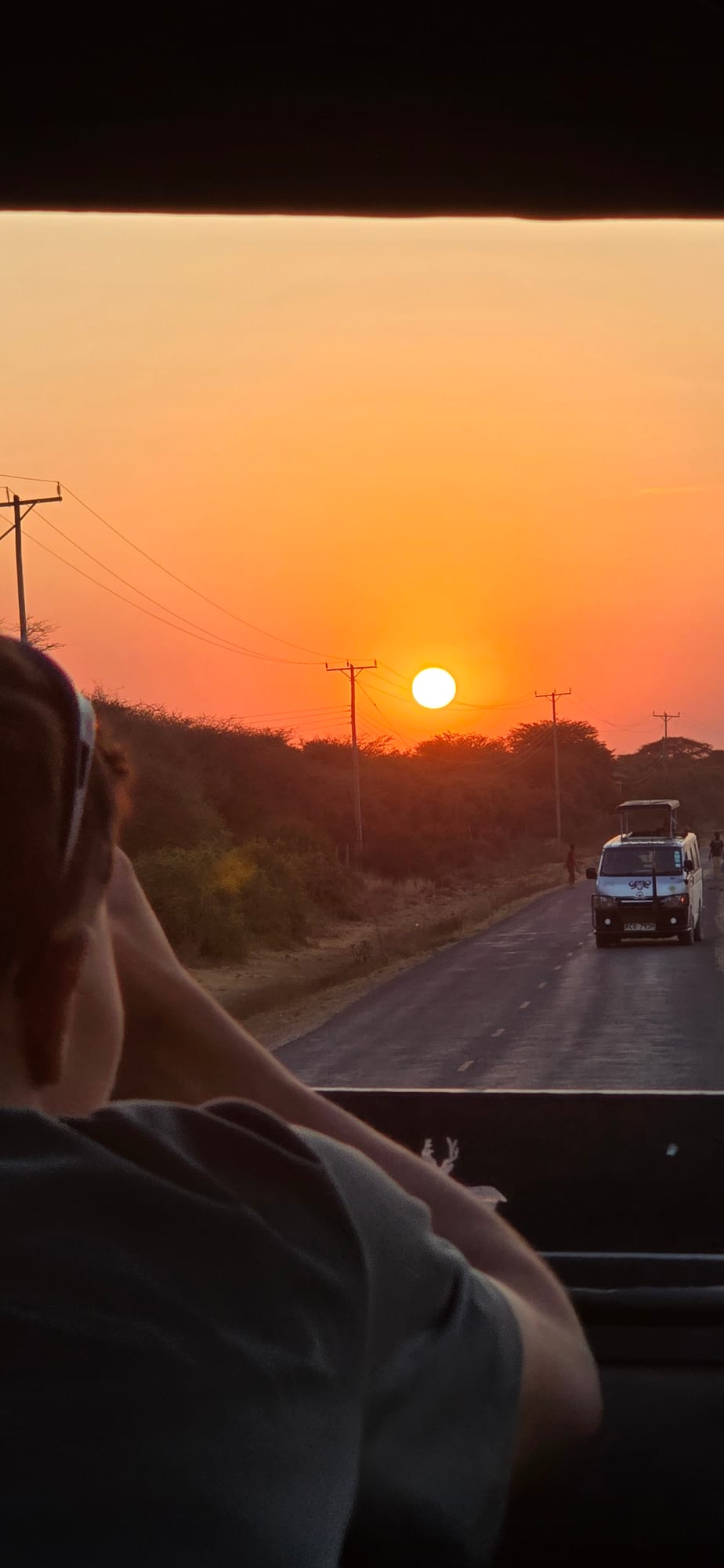 Sunset over the road into Amboseli